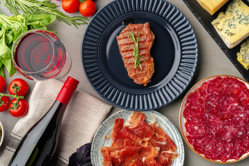 Grilled beef steak served on blue plate