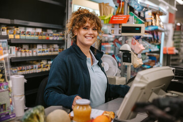 Supermarket cashier at checkout