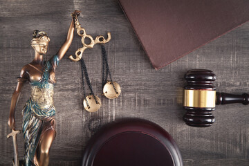  Statue of Lady Justice, book and gavel.