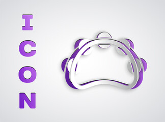 Paper cut Musical instrument percussion tambourine, with metal plates icon isolated on grey background. Paper art style. Vector.