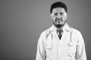 Portrait of bearded Persian man doctor as scientist