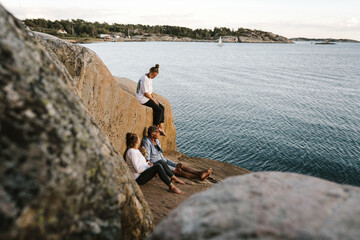 People relaxing at sea
