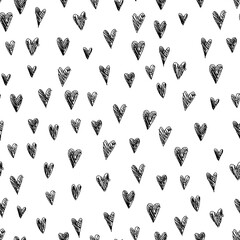 Black and white seamless pattern with doodle hearts. St Valentine day monochrome background in freehand technique.