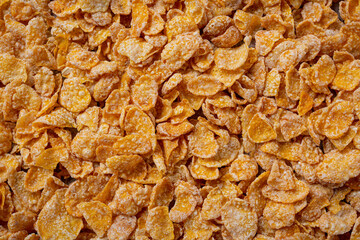 Cereal in bowl and milk on dark background