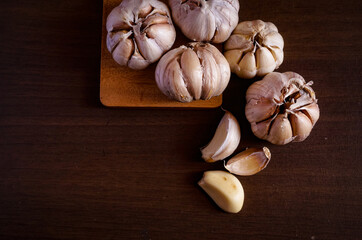 White onions on wooden table, top view