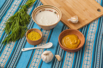 Ingredients for sour cream-mustard sauce. Flat lay