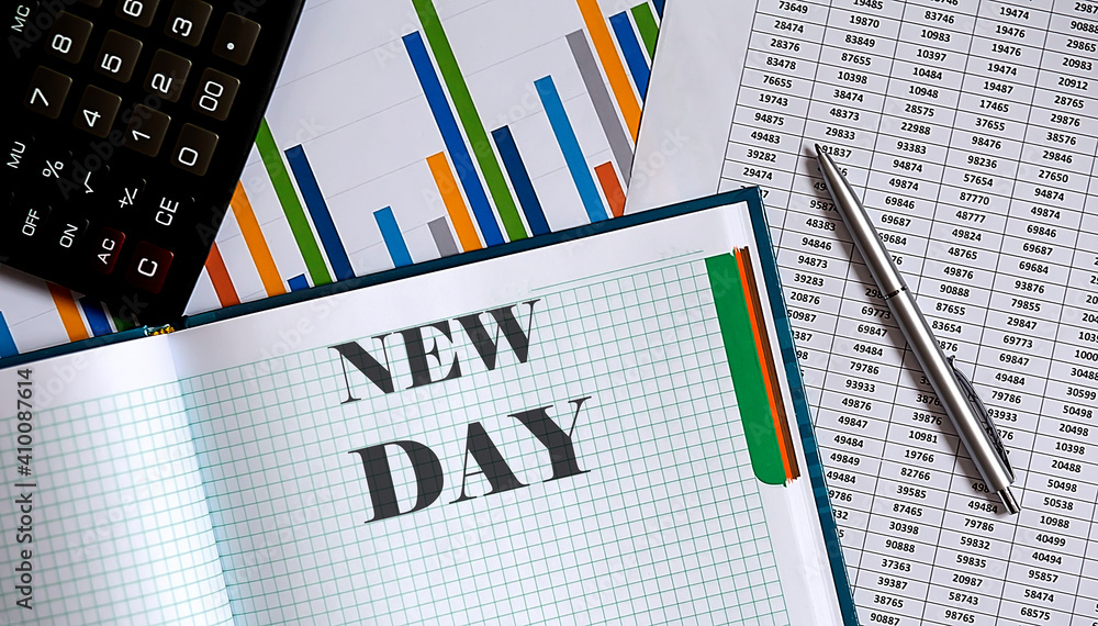 Poster closeup of notebook with text new day on the chart background.