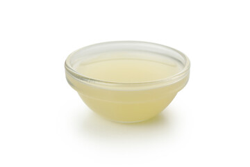 Obraz na płótnie Canvas Glass bowl with lime juice isolated on white background