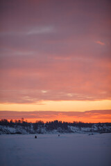 Fototapeta na wymiar Winter sunset in the field. 
