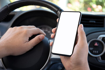 male hands holding phone with isolated screen in car