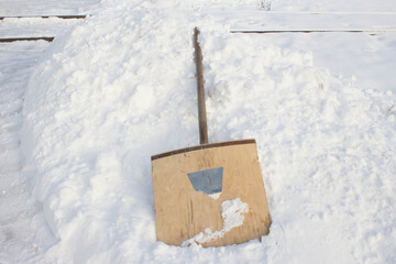 wooden shovel for clearing snow