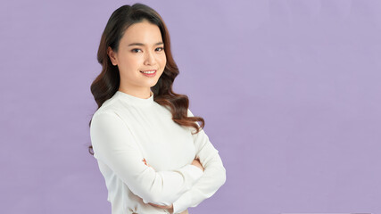 Young cute woman smiling confident with crossed arms.