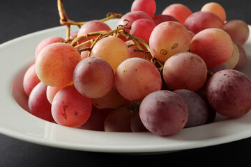 fresh grapes in the plate
