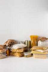 Home food supplies, necessary food for the period of quarantine and isolation, the concept of stay at home, canned food and cereals, various pasta and flour, sugar and cookies, honey