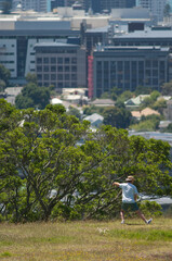 Obraz premium Man practising tai chi. Mount Eden. Auckland. North Island. New Zealand.