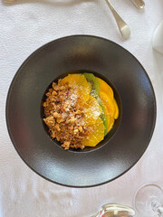 Granola with oranges and mango