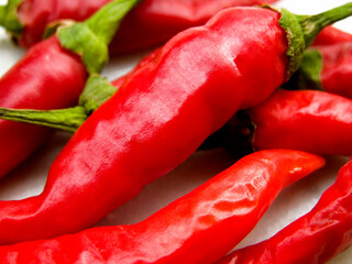 Close-up of freshly harvested red chili peppers from the farmers market