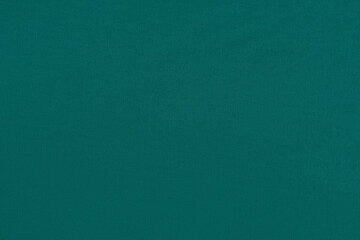 Fototapeta premium Green homogeneous background with a textured surface