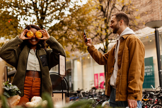 Young couple buying vegetables