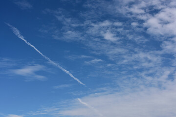 Naklejka na ściany i meble Blue sky with some cloud