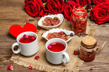 Tea time with rose petals jam and hot beverage