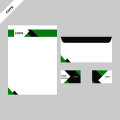 Corporate letterhead, envelope and business card design with a colour combination of green and black.