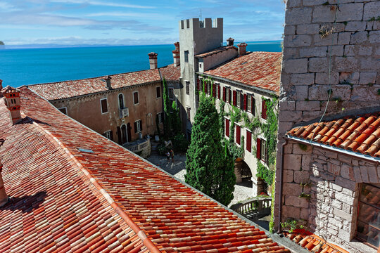 Gothic Duino castle on a cliff over the Gulf of Trieste (Adriatic sea), Italy.