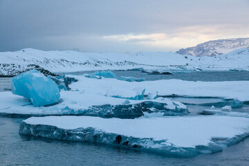 Iceland, Icebergs floating. Ices and volcanic ash. Glacier lagoon. Melting ice. South coast Iceland. Jokullsarlon lagoon