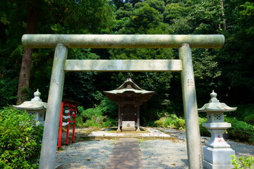 Fototapeta na wymiar Fujisawa / Japan. Yugyo-ji Temple. Uga-jinja Shrine. It is small but built in an elegant style