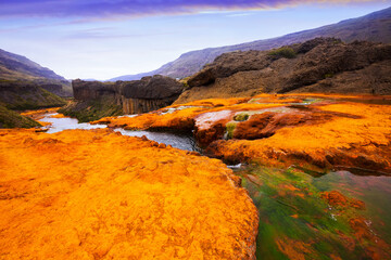 View of Agrio river and stony rapids on summer day. Patagonia, Argentina, South America