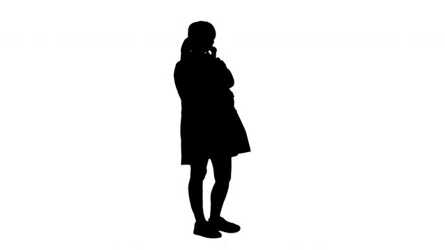 Young attractive pregnant woman listening to music in headphones, Alpha Channel