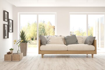 Fototapeta premium White living room with sofa. Scandinavian interior design. 3D illustration