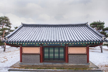 Naklejka premium The Royal tombs of Milsunggun.Kwangju city,Korea.28th,Jan.2021. The historical house of Royal tombs in the forest at winter season.