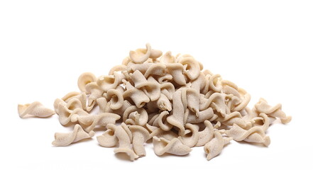 Oat pasta pile isolated on white background