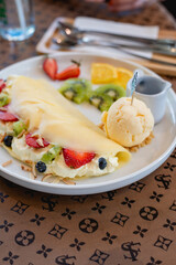 Cold crepes, vanilla ice cream with crepes and strawberry, sweet and desserts