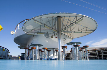 Pooldeck or swimmingpool with sun deck on modern Costa cruiseship or cruise ship liner with sun...