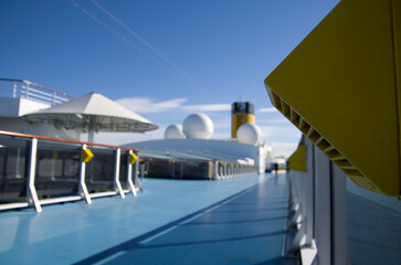 Pooldeck or swimmingpool with sun deck on modern Costa cruiseship or cruise ship liner with sun...