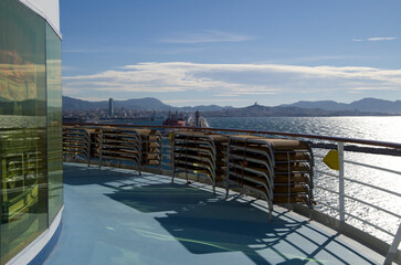 Pooldeck or swimmingpool with sun deck on modern Costa cruiseship or cruise ship liner with sun...