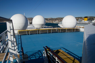 Pooldeck or swimmingpool with sun deck on modern Costa cruiseship or cruise ship liner with sun...