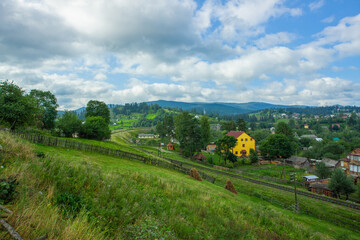 Mountains landscapes hiking trails wilderness forest fields and flowers farm car road haystacks Carpathians