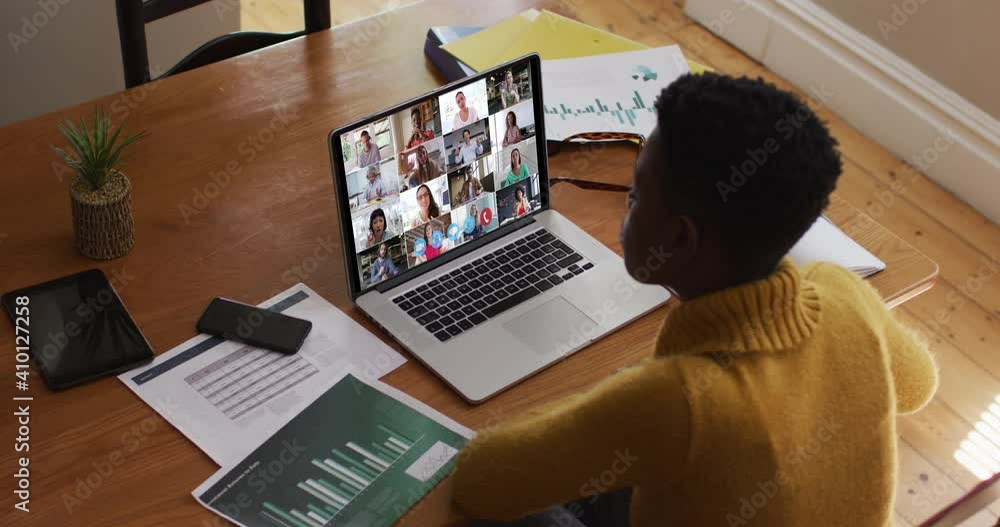 Poster African american woman using laptop on video call with colleagues working from home