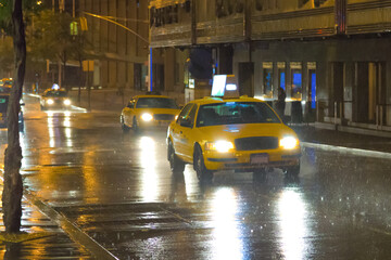 taxi at night in the rain