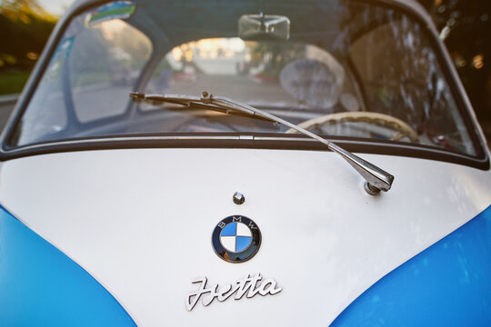 Minsk, Belarus. Aug 2018. BMW classic car logo. BMW Isetta microcar was built in 1955 - small car on the streets of Minsk city.