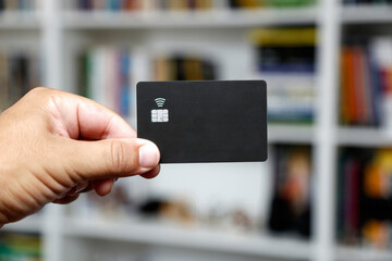 black contactless credit card. Digital payment system.
