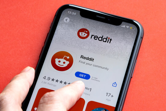 Reddit is a social news aggregation, web content, and discussion website. Registered members submit content to the site. Reddit logo on iPhone 11