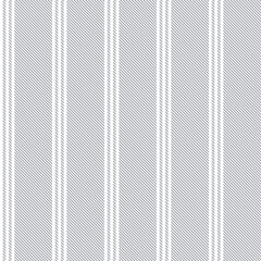Stripe pattern textured in grey and white. Seamless vertical lines classic background graphic for dress, bed sheet, trousers, shirt, wallpaper, or other modern fashion or home textile design.