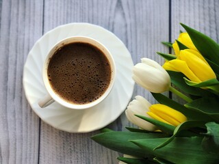cup of coffee with flowers
