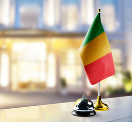 Mali flag on the reception desk in the lobby of the hotel