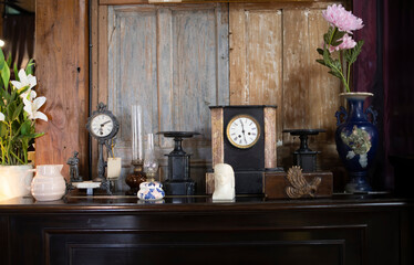 Vintage clocks on oak cupboard