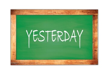 Fototapeta premium YESTERDAY text written on green school board.